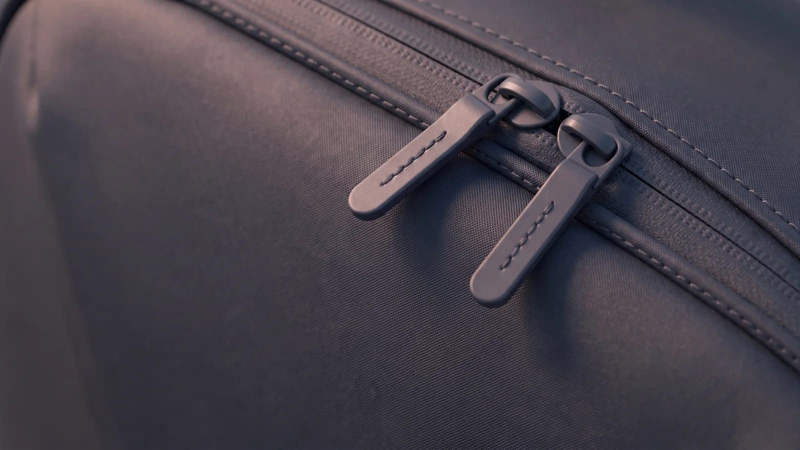 Close view of the Forty’s intended graphite fabric, perimeter seam and zipper